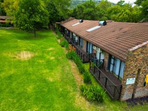 an aerial view of a house with a balcony at The Venue Country Hotel & Spa in Hartbeespoort