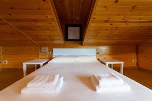 Кровать или кровати в номере Villa Rosemary