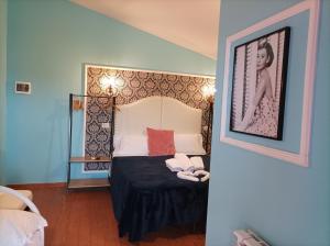 Кровать или кровати в номере Hotel magnolia 1000 mt dal casello