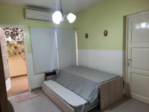 Ένα ή περισσότερα κρεβάτια σε δωμάτιο στο Alojamiento "Mis Raíces" Casa y Departamento