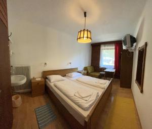 Postel nebo postele na pokoji v ubytování Klammer Gasthof