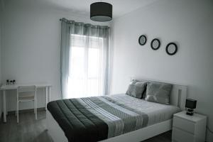 Posteľ alebo postele v izbe v ubytovaní SUNRISE ALOJAMENTO