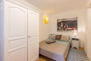 Postel nebo postele na pokoji v ubytování Apartment Stella