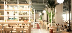 QAWRA Palace Resort & SPA tesisinde bir restoran veya yemek mekanı