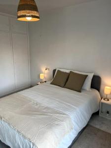 Katil atau katil-katil dalam bilik di El apartamento de Ordes