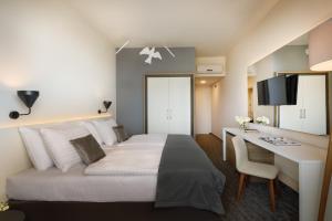 TV/Unterhaltungsangebot in der Unterkunft Remisens Hotel Albatros-All inclusive