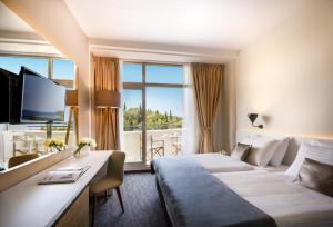 TV/Unterhaltungsangebot in der Unterkunft Remisens Hotel Albatros-All inclusive