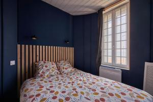 Posteľ alebo postele v izbe v ubytovaní Château de Chimay - Appt en front de mer