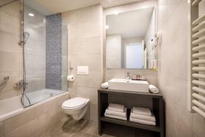Ein Badezimmer in der Unterkunft Remisens Hotel Albatros-All inclusive