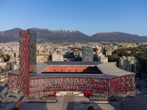 an aerial view of a building with a stadium at Tirana Marriott Hotel in Tirana