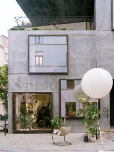 a house with a large window and a white orb at Teddy Picker in Brussels