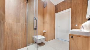 Een badkamer bij Apartamenty Sun & Snow Portova z sauną