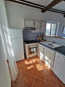 Imagen de la galería de Appartement Palazzo Patrimonio, en Patrimonio