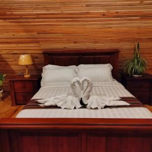 Postelja oz. postelje v sobi nastanitve Nsaho resort