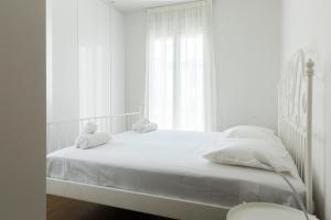 Tempat tidur dalam kamar di Cosy Malia Maisonette