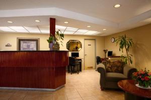 a hospital lobby with a reception desk and a waiting room at Days Inn by Wyndham San Diego/Downtown/Convention Center in San Diego