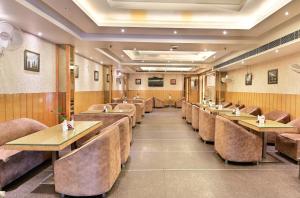 Posezení v ubytování Aman International-A New Unit of Aman Continental + 25 fotografií
