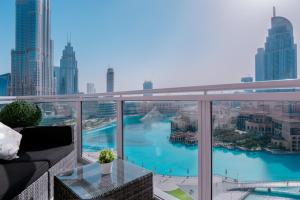 a balcony with a view of a city at Elite Royal Apartment - Full Burj Khalifa and Fountain View - The Royal in Dubai