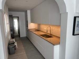 Kuchyňa alebo kuchynka v ubytovaní Casa Verkath-playa Burriana