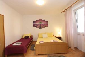 a bedroom with two beds and a window at Apartment in Silo/Insel Krk 13555 in Šilo