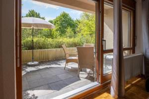 Balkón nebo terasa v ubytování Ruhige 2-Zimmer Wohnung m.Terrasse,Nähe Uni-Klinik