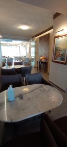 A seating area at THEMIS BEACH