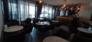 A restaurant or other place to eat at THEMIS BEACH