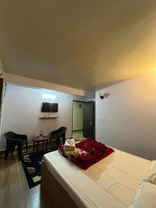 Postel nebo postele na pokoji v ubytování Hannah Homestay
