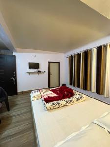 Postel nebo postele na pokoji v ubytování Hannah Homestay