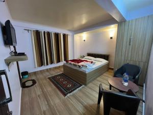 Postel nebo postele na pokoji v ubytování Hannah Homestay
