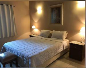 Gulta vai gultas numurā naktsmītnē Mandala Apartments