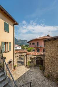 a view of a building from the balcony of a house at La Filanda Apartments by Wonderful Italy - Canapa in Bellagio