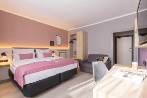 Un pat sau paturi într-o cameră la Yggotel Spurv