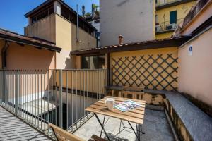 A balcony or terrace at Napoleone's Nest - Elegant and Central