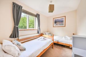 Ένα ή περισσότερα κρεβάτια σε δωμάτιο στο 3 bed Lodge with EV point