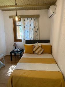 Postel nebo postele na pokoji v ubytování Gal House