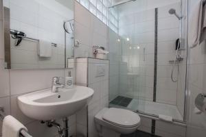 Bagno di AKZENT Strandhotels Seestern, Delphin & Lachs