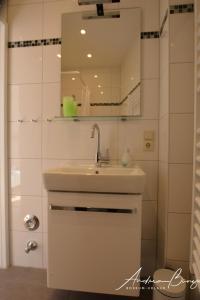 Kúpeľňa v ubytovaní Lübbos-Drööm