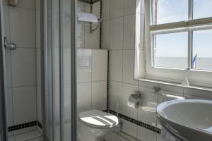 Bagno di AKZENT Strandhotels Seestern, Delphin & Lachs