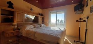 Posteľ alebo postele v izbe v ubytovaní Port Frejus 1er etage de villa vue sur mer, 8-9 Pe