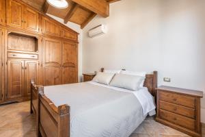 A bed or beds in a room at Girasole