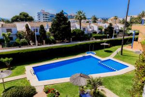 Bazén v ubytovaní Menorca Duplex Javea Montanar II by Rock Rentals alebo v jeho blízkosti
