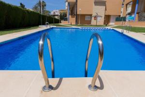 Bazén v ubytovaní Menorca Duplex Javea Montanar II by Rock Rentals alebo v jeho blízkosti