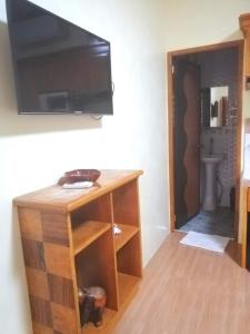 TV a/nebo společenská místnost v ubytování Binalonan Transient/GUESTHOUSE (PENSION GLAYDIE)