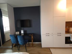 Kuchyňa alebo kuchynka v ubytovaní Warsaw To Be - Blue Apartment