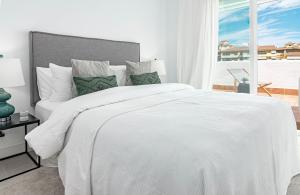 Cama o camas de una habitación en LAL- Fantastic family apartment close to beaches