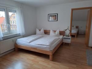 Posteľ alebo postele v izbe v ubytovaní Waldhorn Alleenring Apartments