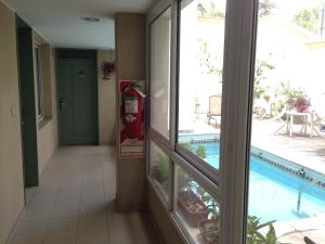 A piscina localizada em Cóndor Suites Apart Hotel ou nos arredores