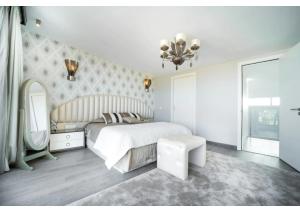 A bed or beds in a room at El Higuerón con Vistas al Mar