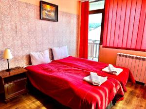 Postel nebo postele na pokoji v ubytování Family Hotel Carpe Diem